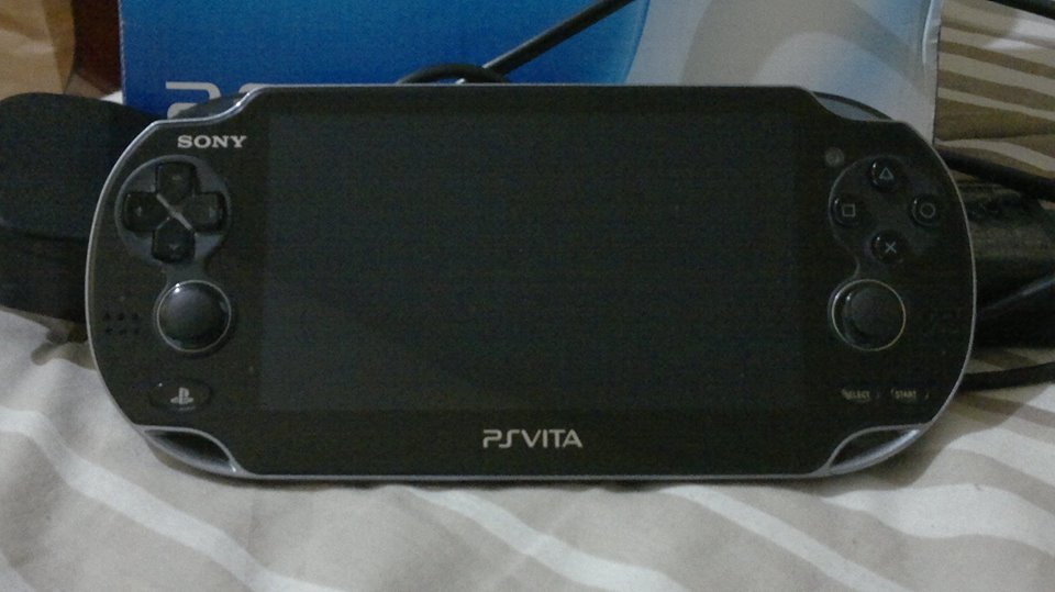 PS Vita Phat 8GB with 3 games photo